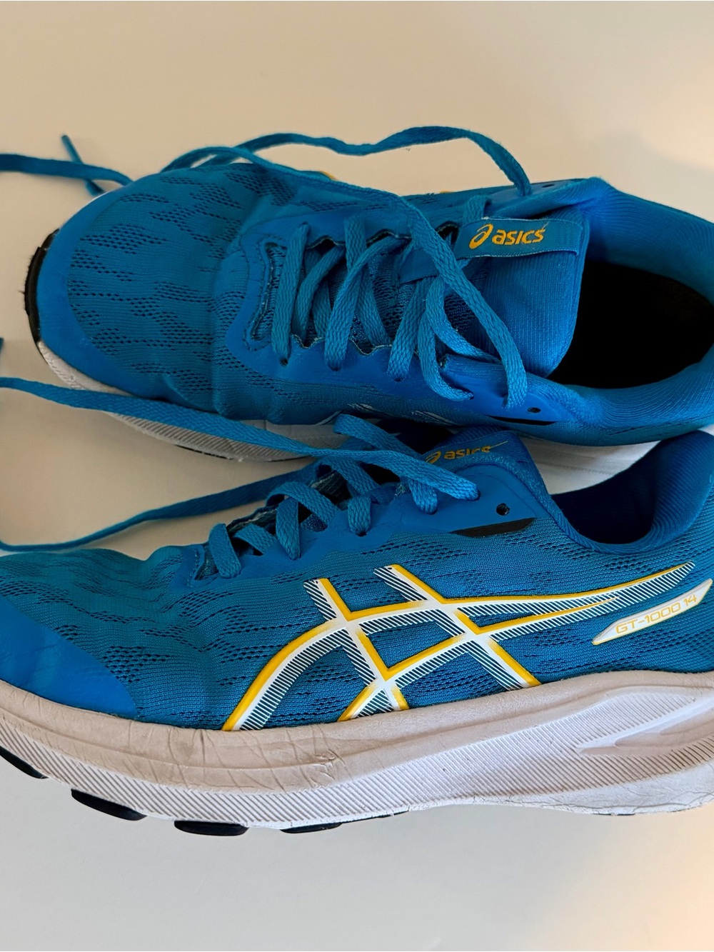 Asics Blue Athletic Running Shoes with Yellow Accents